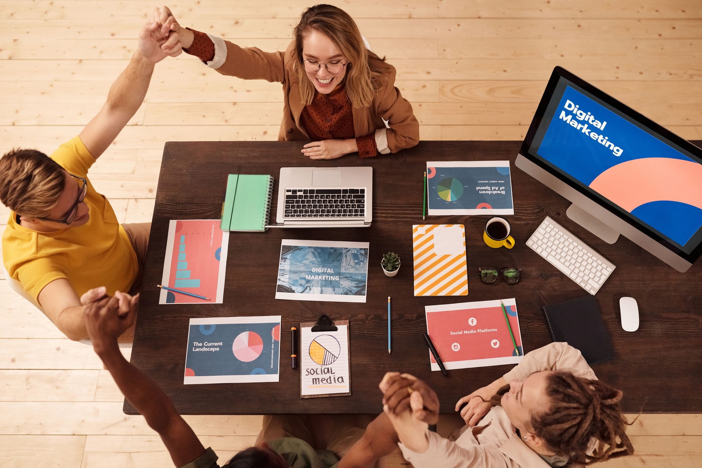 Marketing team working together in a bright office