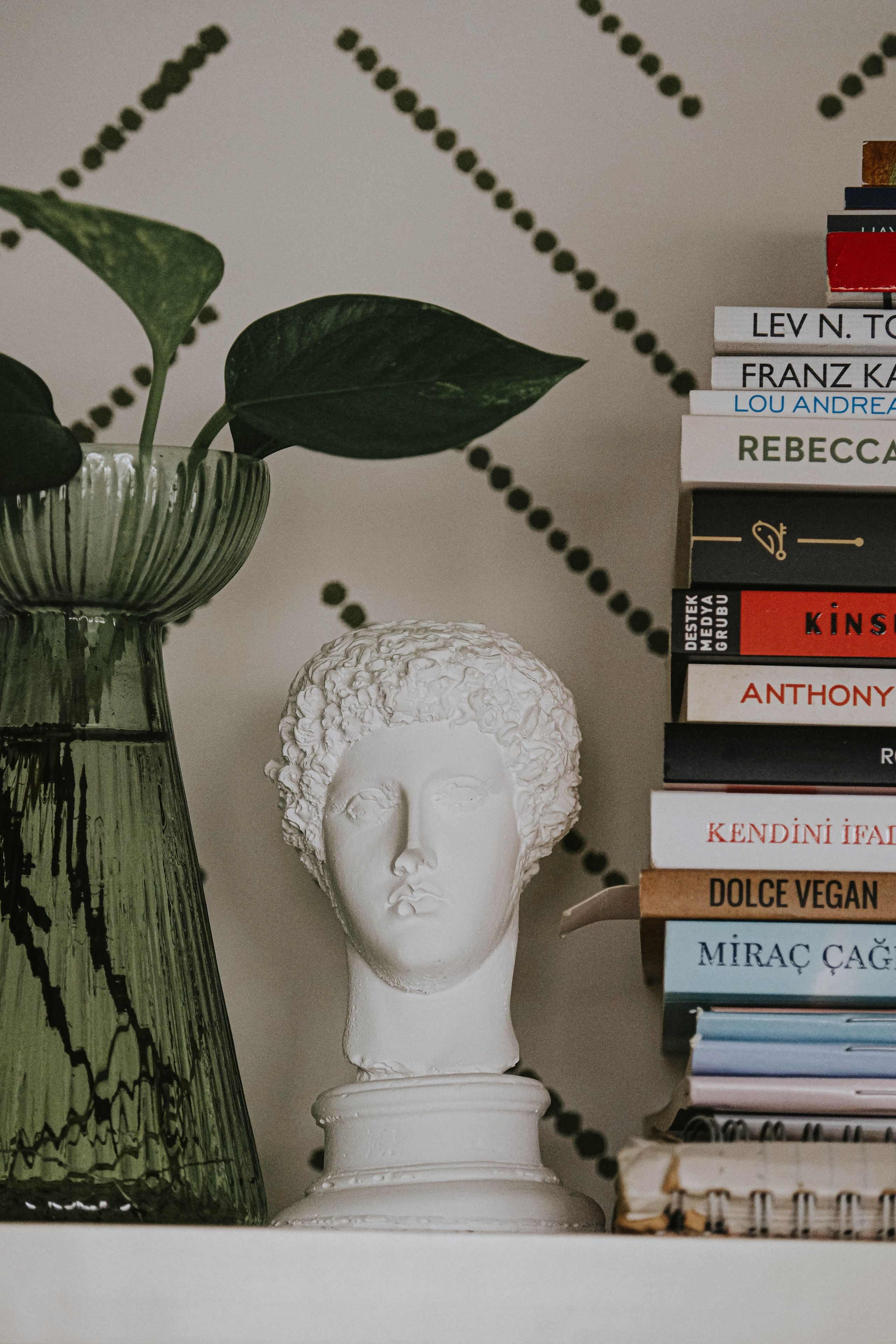 Home accessories styled together on a shelf